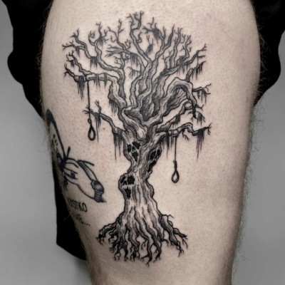 Creepy tree tattoo on the leg with spaces for hangmen.