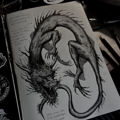Dragon drawing in a sketchbook in a dark gloomy mood