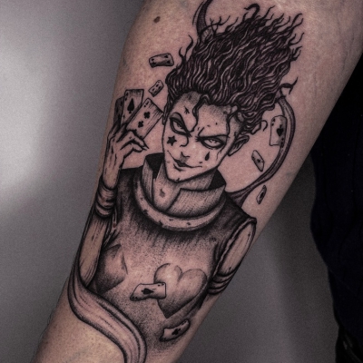 Anime inspired tattoo on forearm